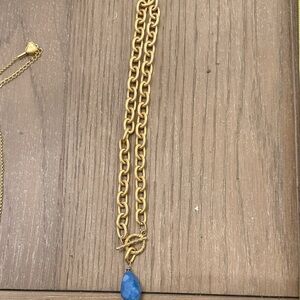 Elegant Gold Necklace with Blue Pendant